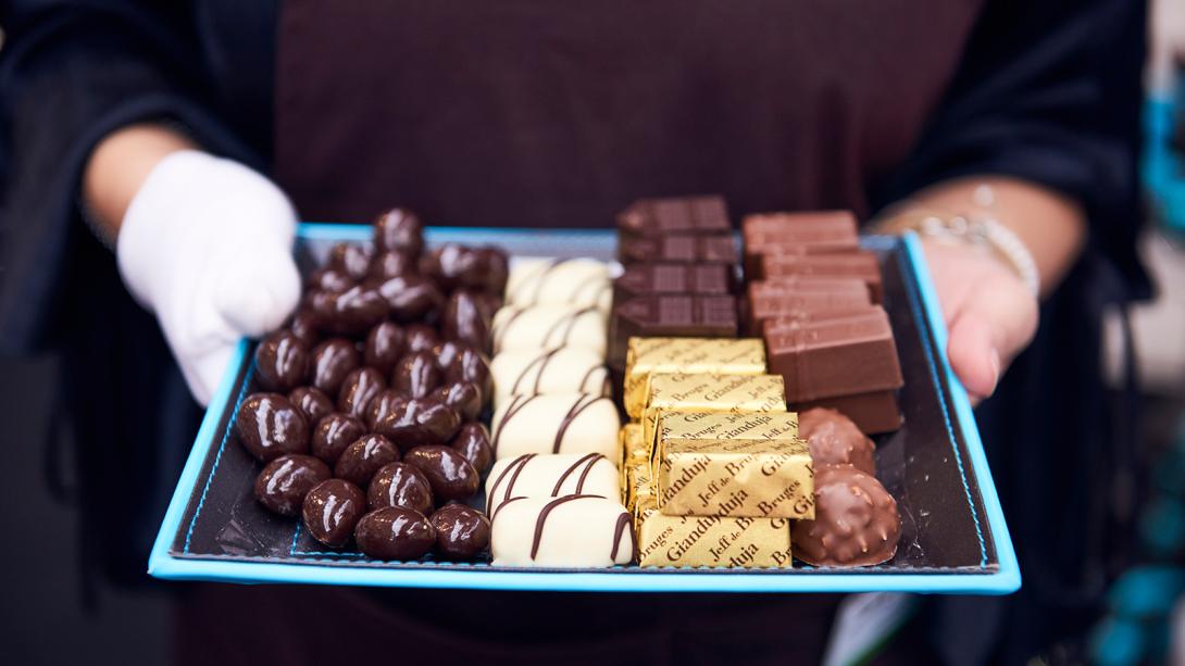 Chocolate samples being offered at an event