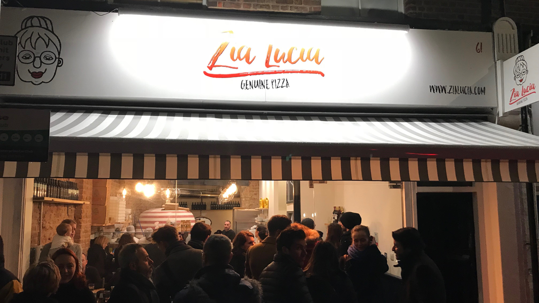 Zia Lucia exterior with a queue of guests